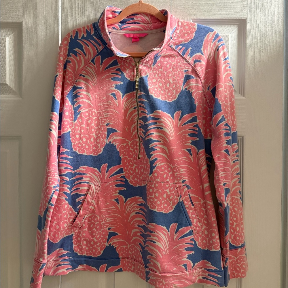 Lilly Pulitzer Pink Pineapple Half-Zip Sweatshirt with Blue Background